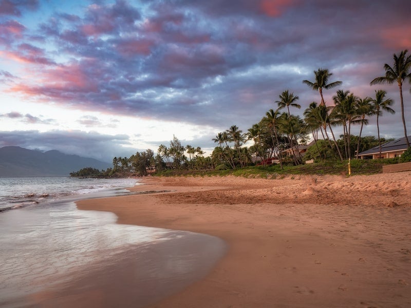 Sunset at Kamaole Beach with view of waterfront homes, Kihei, Maui