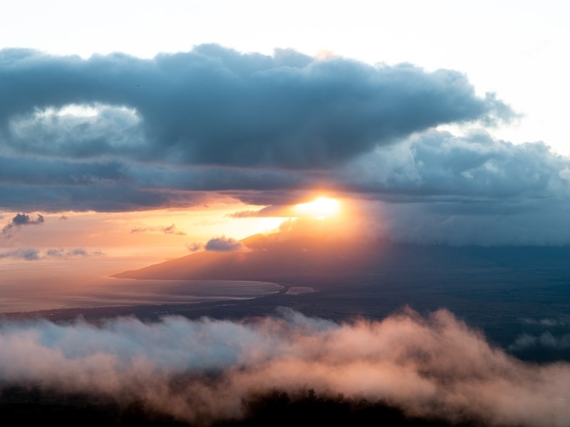 Sunset over clouds in Upcountry, Maui from mountainside